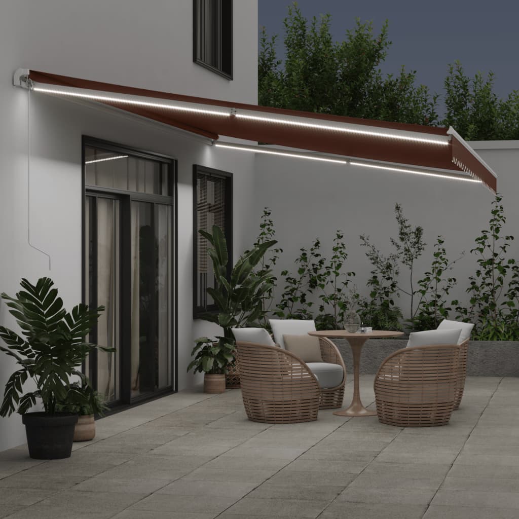 vidaXL Copertină retractabilă manual cu LED, maro, 600x300 cm